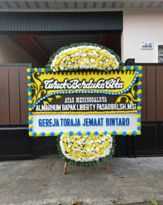Papan Bunga Duka di Telluwanua